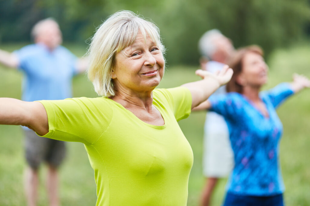 Sporty,Seniors,Stretch,Out,Their,Arms,In,A,Wellness,Yoga